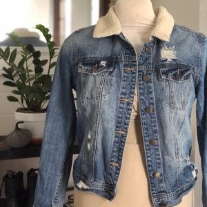 Mossimo distressed denim jacket with fuzzy color.